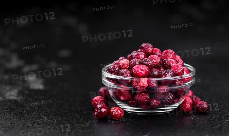 Portion of healthy Dried Cranberries (selective focus, close-up shot)