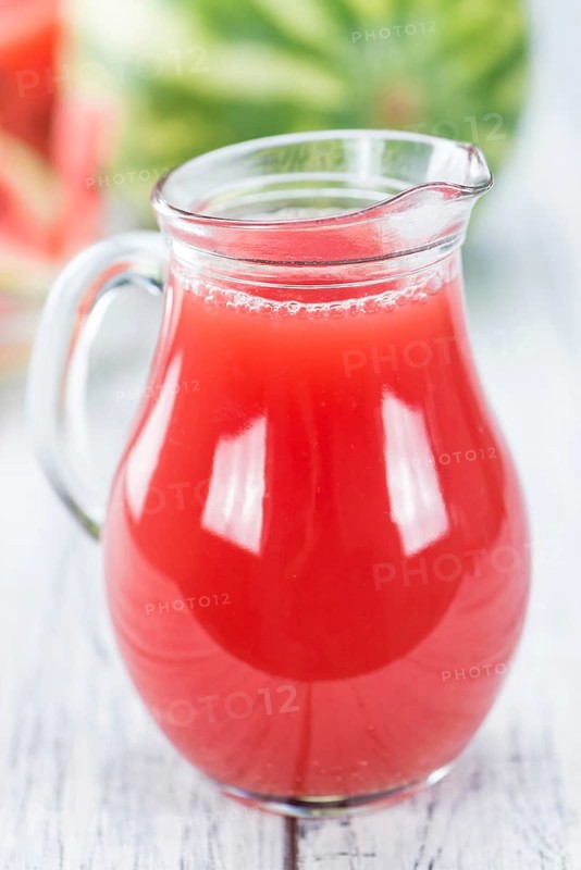 Watermelon Smoothie on a vintage background as detailed close-up shot (selective focus)