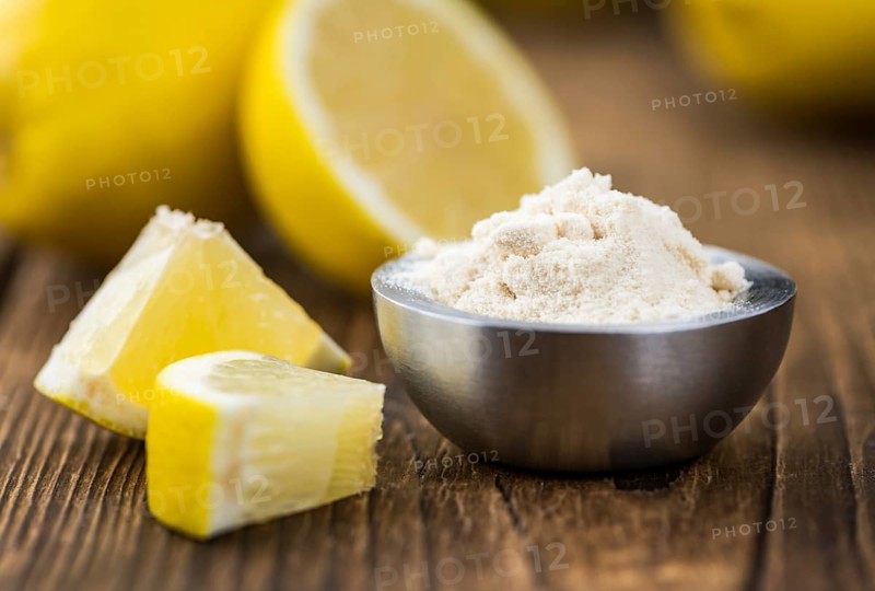 Portion of healthy Lemon powder (selective focus, close-up shot)