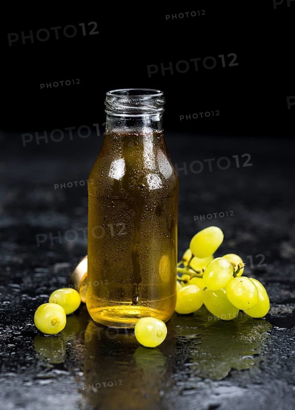 Some healthy Grape Juice (selective focus, close-up shot)