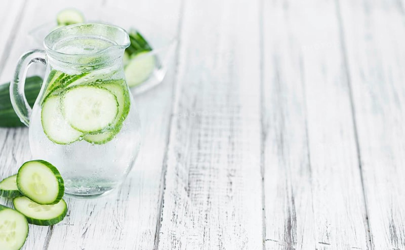 Homemade Cucumber Water on vintage background selective focus, close-up shot