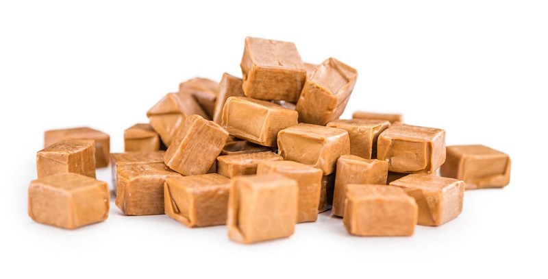 Portion of fresh made Caramel isolated on white background