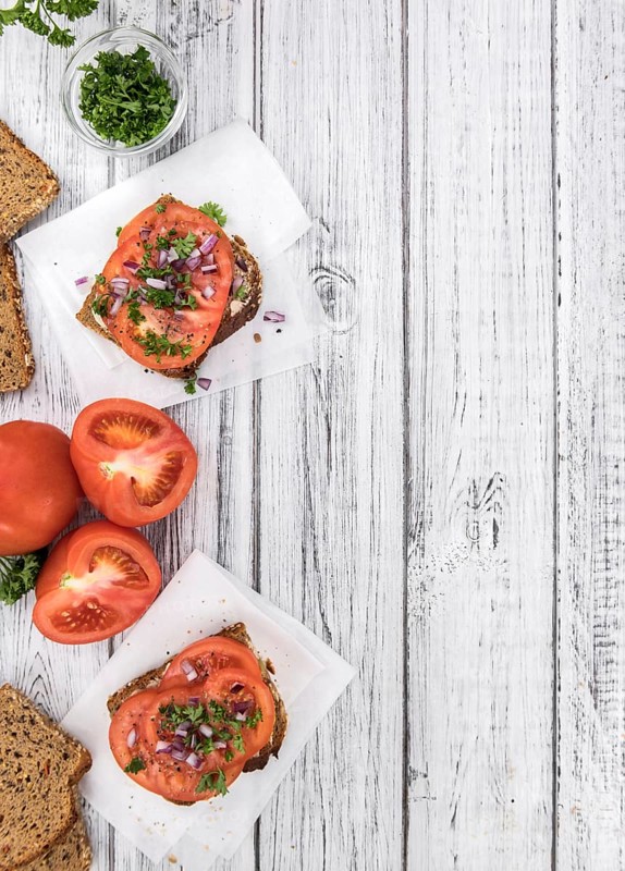 Portion of fresh Tomato Sandwich (selective focus, close-up shot)