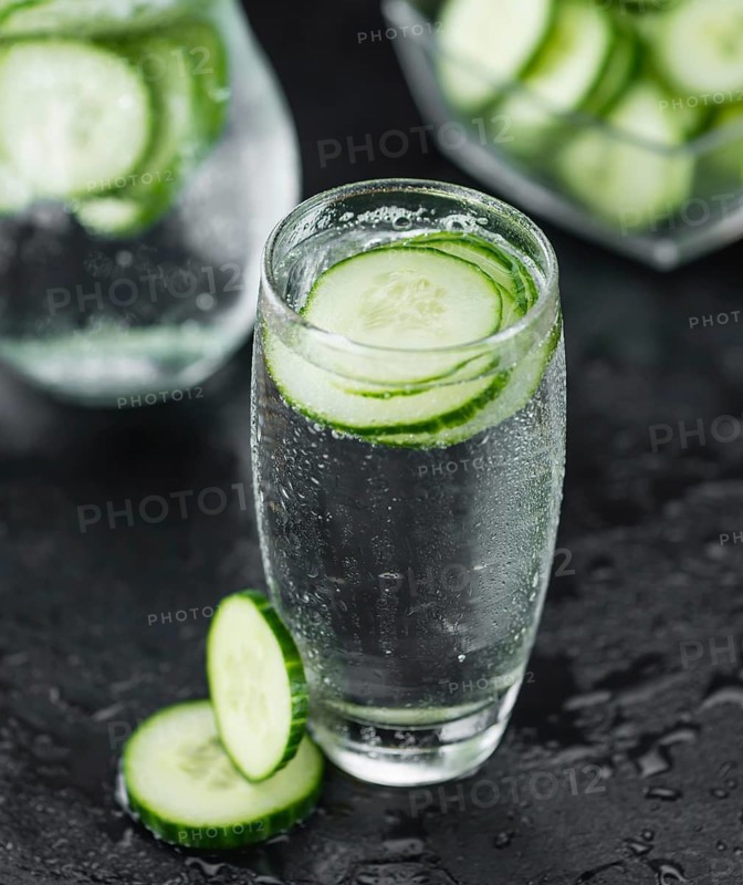 Some fresh Cucumber Water on a vintage slate slab, selective focus, close-up shot