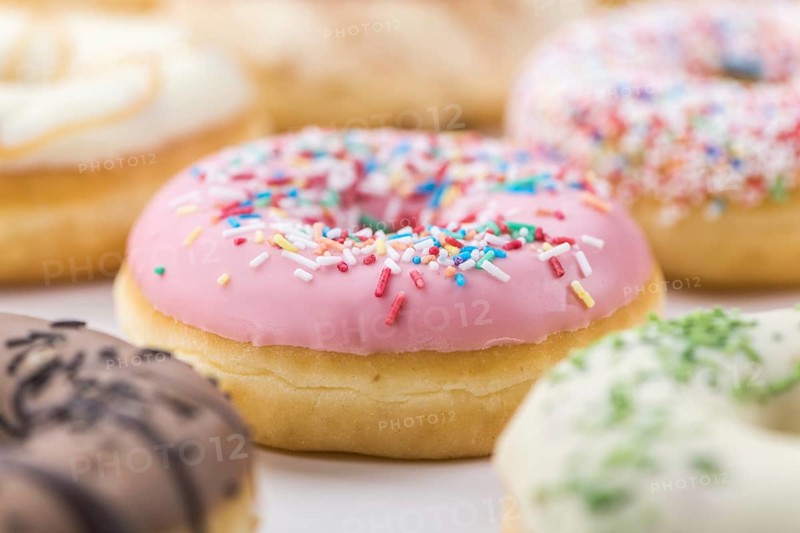 Fresh made Donuts as detailed close-up shots (selective focus)