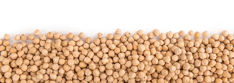 Portion of Chickpeas as detailed close-up shot isolated on white background