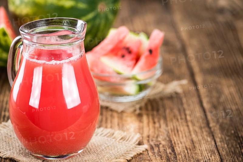 Watermelon Smoothie on a vintage background as detailed close-up shot (selective focus)
