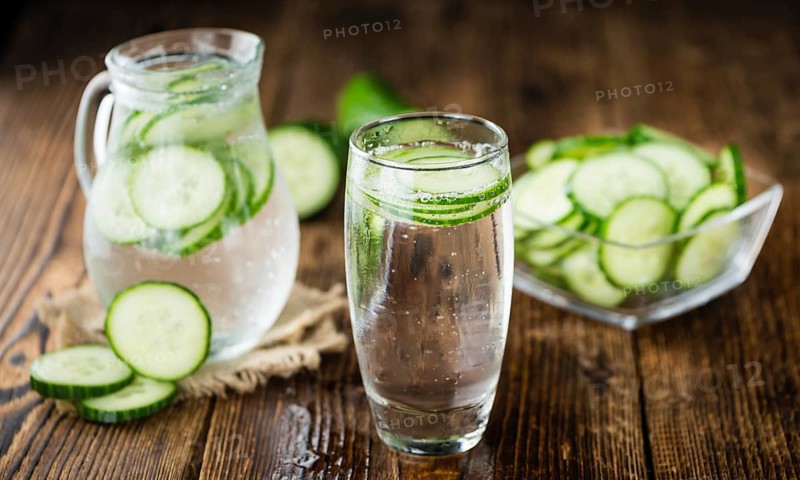Homemade Cucumber Water on vintage background selective focus, close-up shot