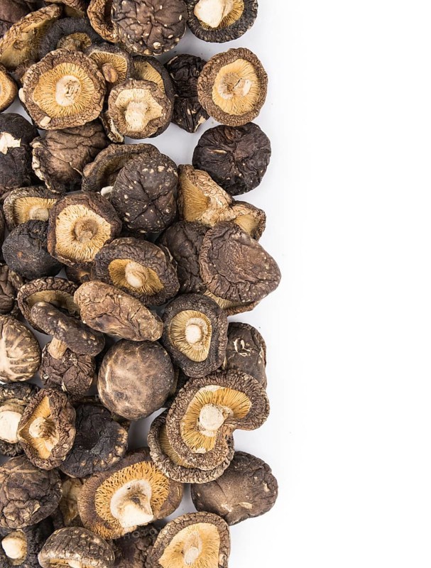 Portion of Dried Shiitake as detailed close-up shot isolated on white background