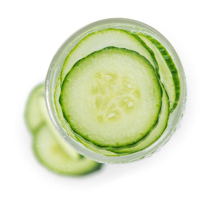 Portion of Cucumber Water as detailed close-up shot isolated on white background