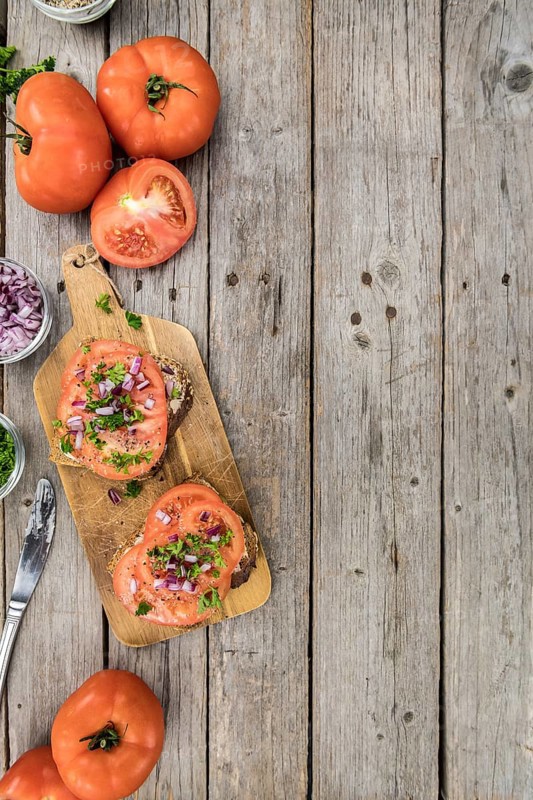 Portion of fresh Tomato Sandwich (selective focus, close-up shot)