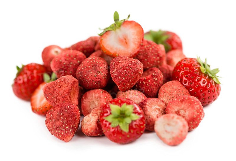 Fresh made Strawberries (dried) isolated on white background, close-up shot