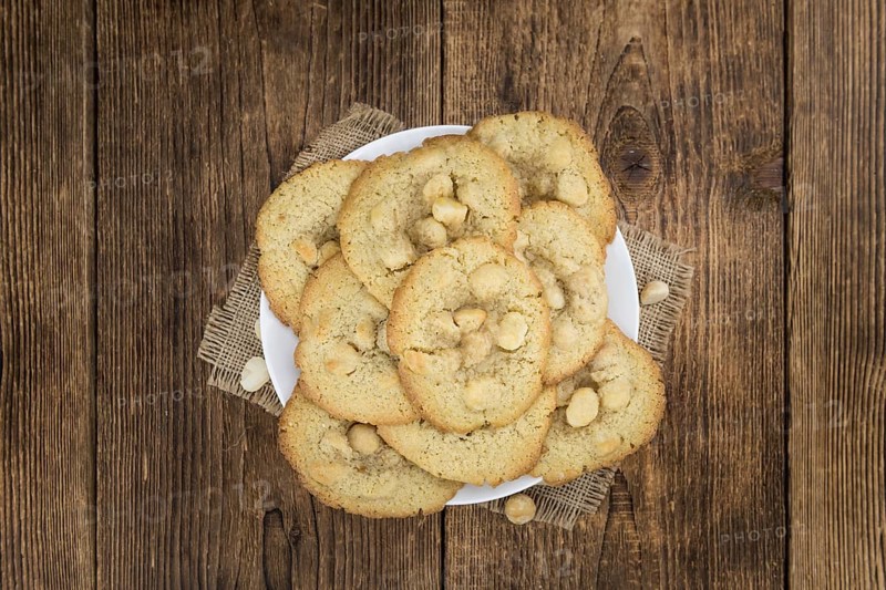Portion of Macadamia Cookies as detailed close-up shot, selective focus