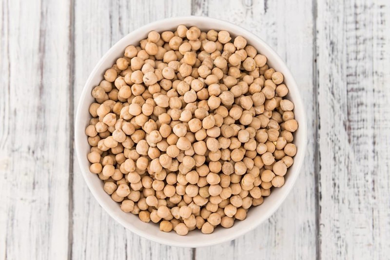 Portion of fresh Chickpeas close-up shot, selective focus