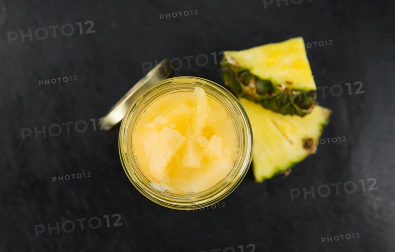 Portion of fresh Preserved Pineapple pieces close-up shot, selective focus