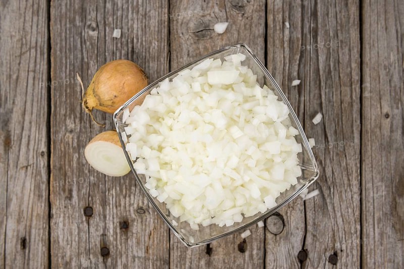 Some homemade White Onions (dices) as detailed close-up shot, selective focus