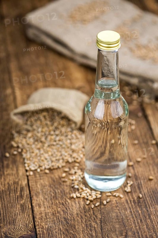 Portion of Wheat Liqueur as detailed close-up shot, selective focus