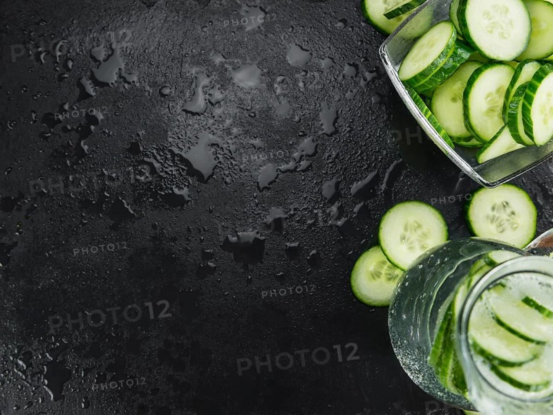Cucumber Water on a vintage background as detailed close-up shot, selective focus