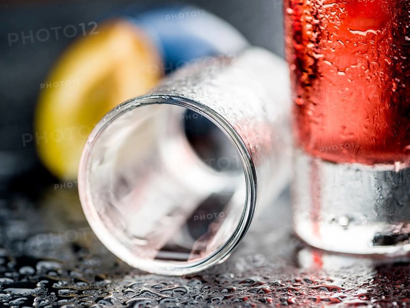 Fresh made Plum Liqueur on a vintage background as detailed close-up shot
