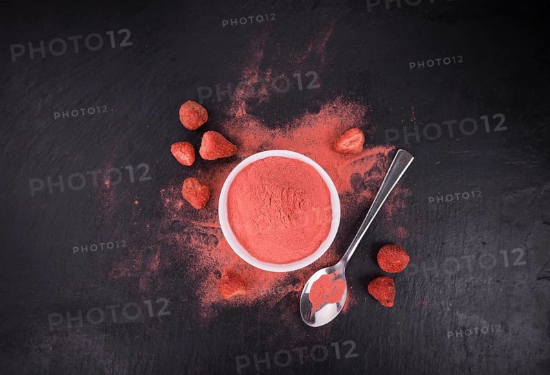 Some Instant Strawberries on a vintage slate slab, selective focus