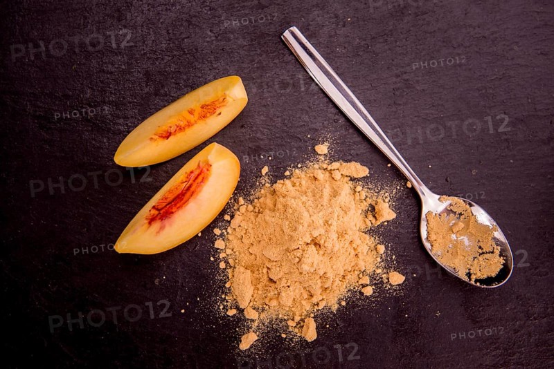 Portion of fresh Ground Peaches close-up shot, selective focus