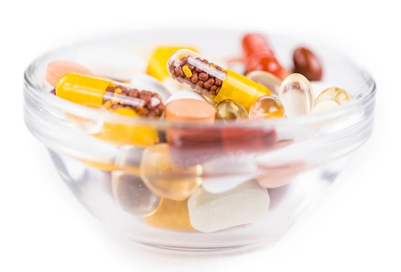 Drugs as detailed close-up shot (selective focus) isolated on white background