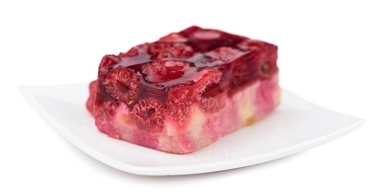 Fresh homemade Raspberry Cake isolated on white background