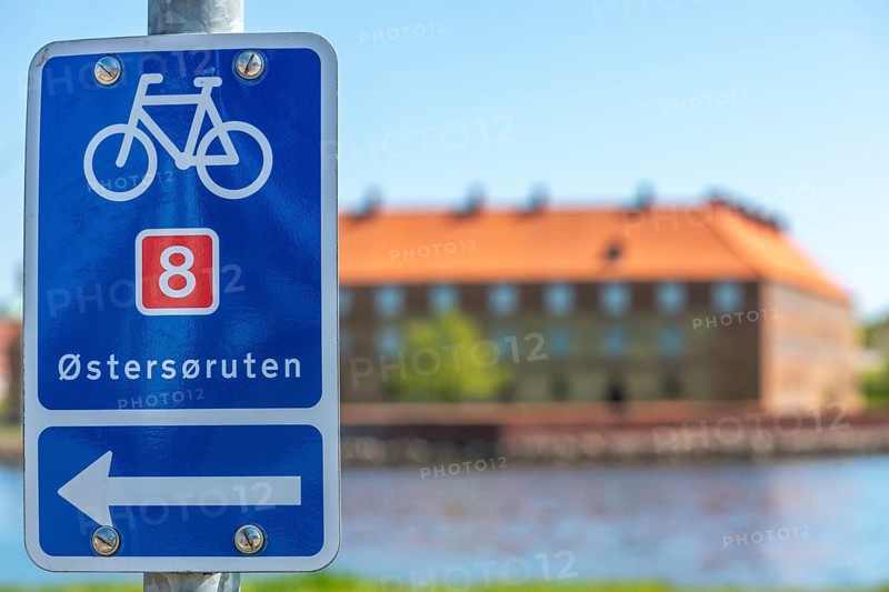 Sonderborg, Als, Sonderburg, cyclist, Ostersoruten 8 sign, Baltic Sea Cycle Route 8, brick building at Sonderburg Castle, Museum of Cultural History, Alsen Island, Flensburg Fjord, Baltic Sea, Denmark, Europe
