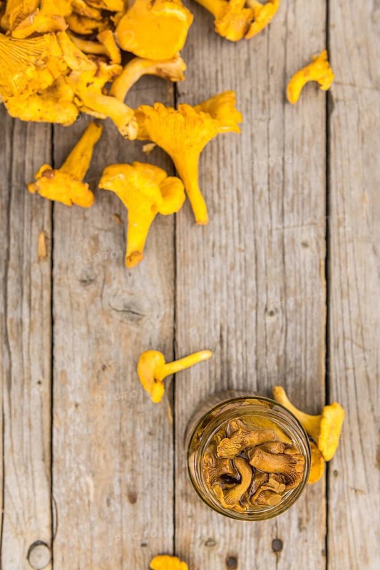 Portion of fresh Canned chanterelles close-up shot, selective focus