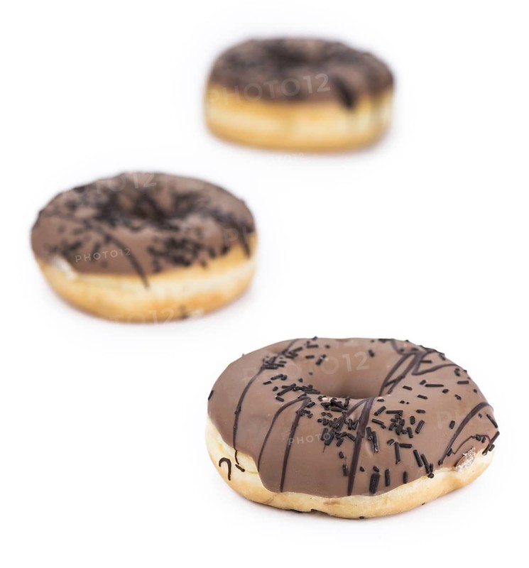 Donuts isolated on white background with a soft shadow (close-up shot)