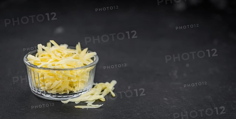 Fresh made Grated Cheese as detailed close-up shot