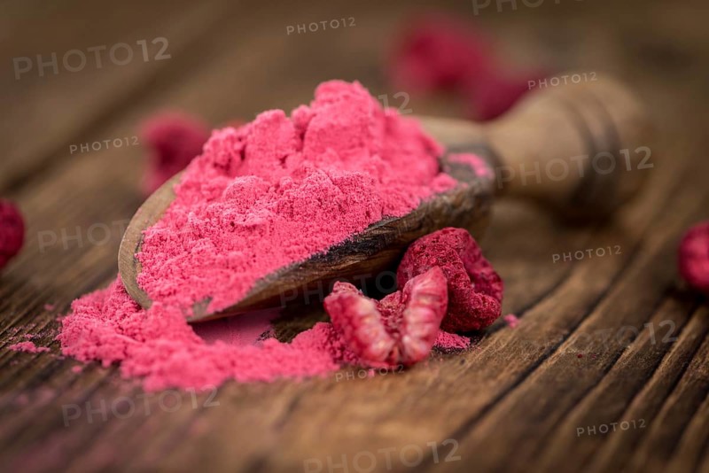 Homemade Ground Raspberries on vintage background selective focus, close-up shot