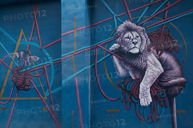 Lion and mouse hanging in ropes, mural by Greek street artist Nikolaos Tsounakas, Psirri neighbourhood, Athens, Greece, Europe