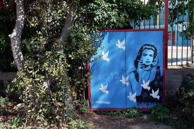 Portrait of Melina Mercouri on an electricity box, graffiti by street artist Ms Akaterini, Athens, Greece, Europe