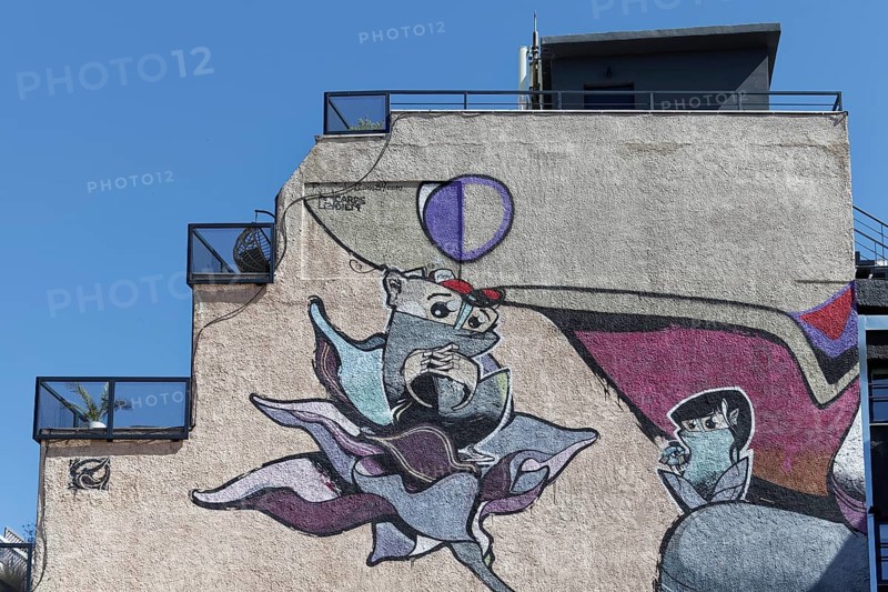 Bizarre figure growing out of a flower, surreal mural by street artist Same84 Carpe Diem, Psirri neighbourhood, Athens, Greece, Europe