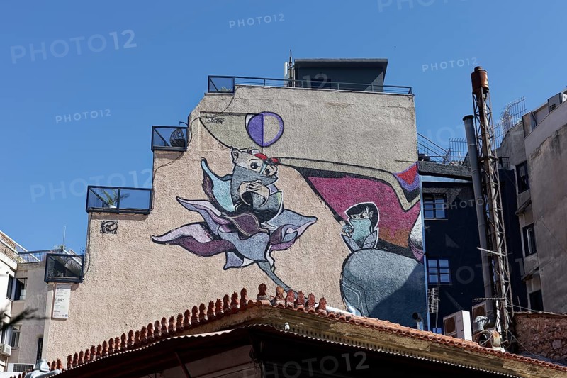 Bizarre figure growing out of a flower, surreal mural by street artist Same84 Carpe Diem, Psirri neighbourhood, Athens, Greece, Europe