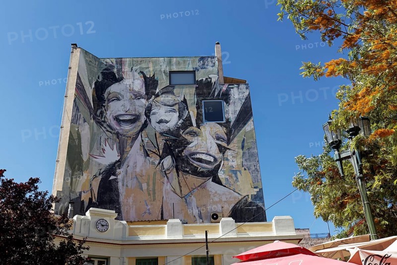 Figure with three different heads, mural by Greek street artist Vasmou, entitled Superman, Psirri neighbourhood, Athens, Greece, Europe