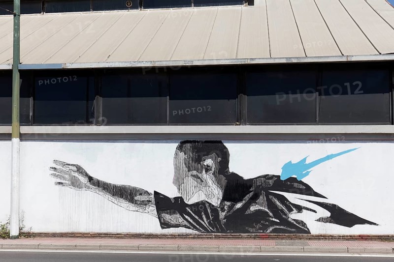 Man with outstretched arm, surreal mural in black and white by Greek street artist INO, Gazi neighbourhood, Athens, Greece, Europe