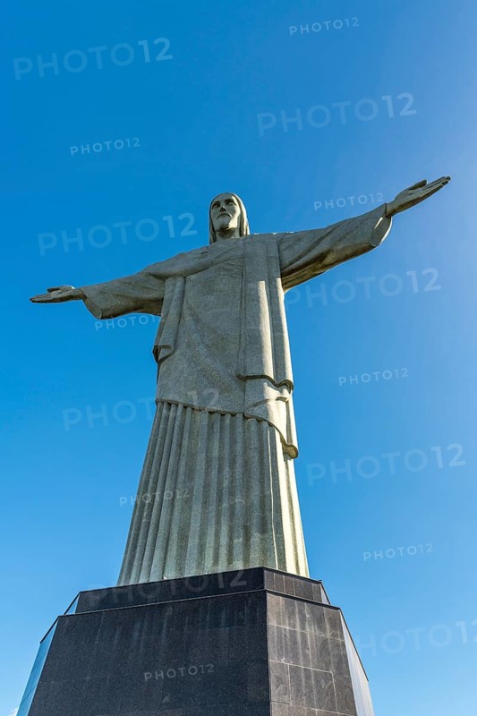 Christ the Redeemer statue in Rio de Janeiro, Brazil with blue sky in the background