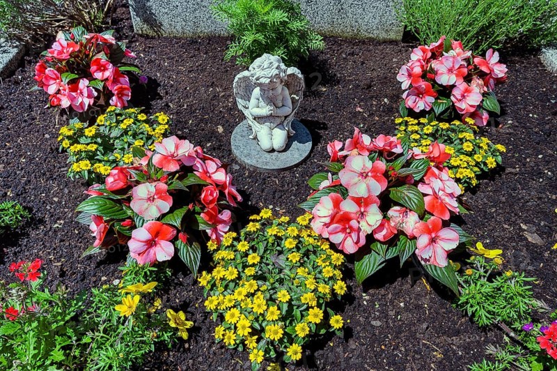 Grave with floral decoration and cherub, Allgäu, Swabia, Bavaria, Germany, Europe