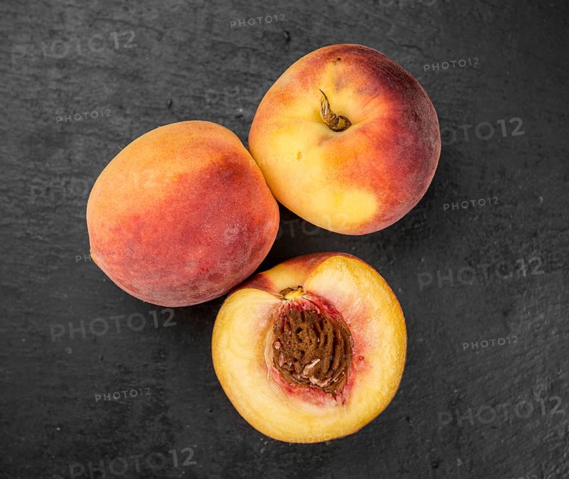 Portion of fresh Peaches close-up shot, selective focus
