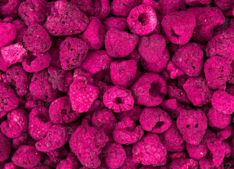 Some homemade Raspberries (dried) as detailed close-up shot, selective focus