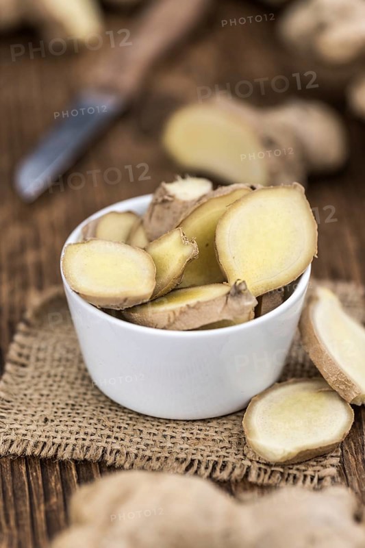 Some fresh Ginger Slices (selective focus, close-up shot)
