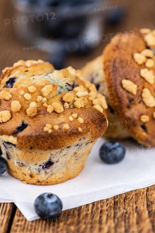 Fresh Blueberry Muffins as detailed close-up shot (selective focus)