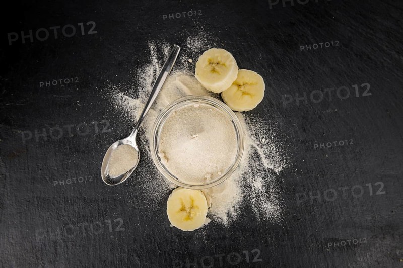 Portion of fresh Banana Powder close-up shot, selective focus