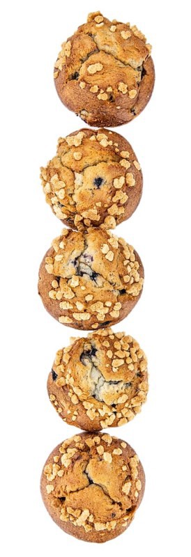 Blueberry Muffins isolated on white background (selective focus, close-up shot)