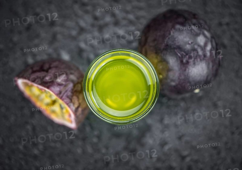 Passion Fruit Liqueur as detailed close-up shot, selective focus