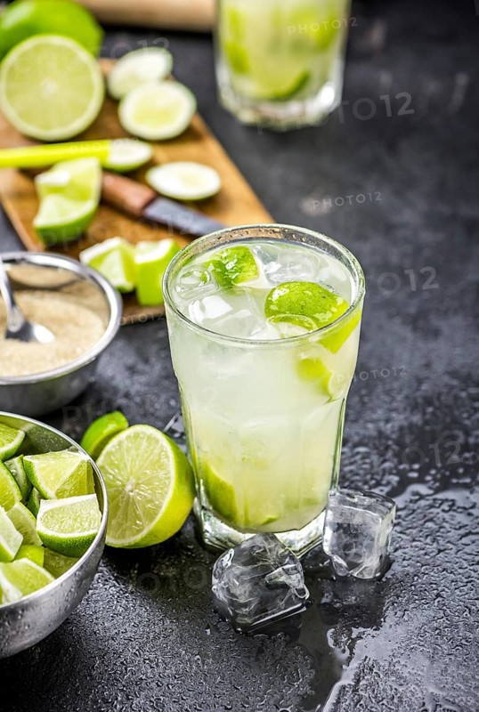 Slate slab with Caipirinha (selective focus, close-up shot)