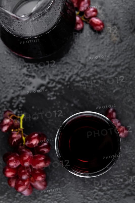 Some fresh Red Grape Juice (selective focus, close-up shot)