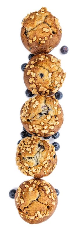 Blueberry Muffins isolated on white background (selective focus, close-up shot)